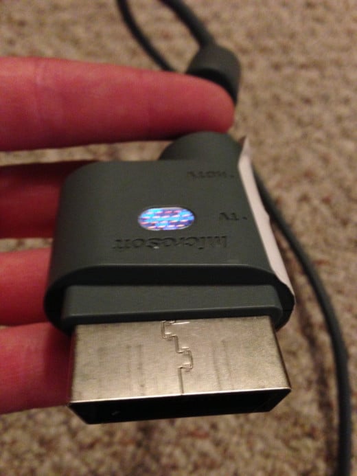 The connector for the AV/Component cable is the lone piece on the opposite side of where the AV and component connectors are located.