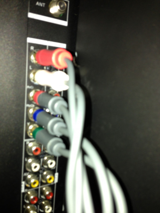 Plug the component connectors into the matching-colored inputs associated with an available component input on your TV. Plug the audio cables into the audio jacks associated with the component input.