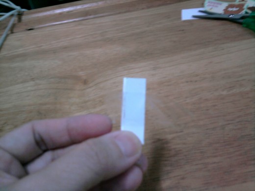Fold the paper a few times, bound it with a sellotape