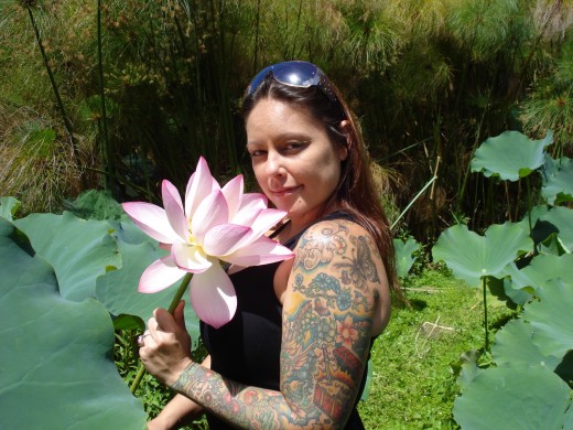 In the lotus patch...big blossoms make me look smaller, lol!!