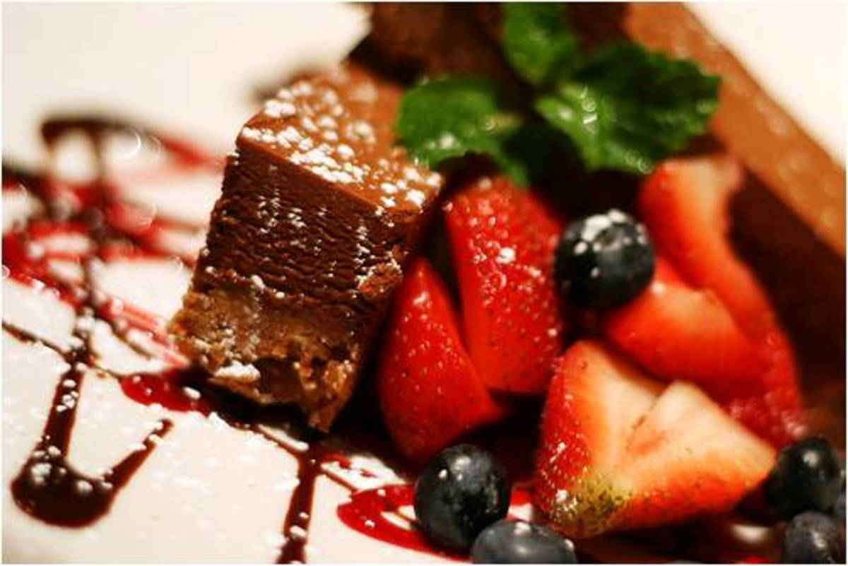 Chocolate squares with blueberries and strawberries
