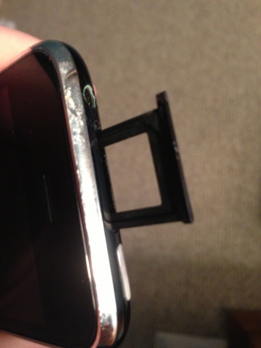Insert the empty SIM card tray back into the SIM card slot.