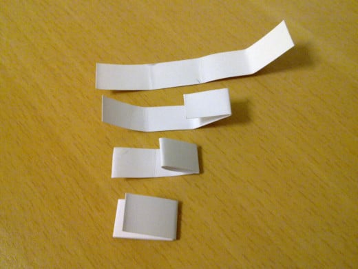 fold the rectangle card twice to form a small stub