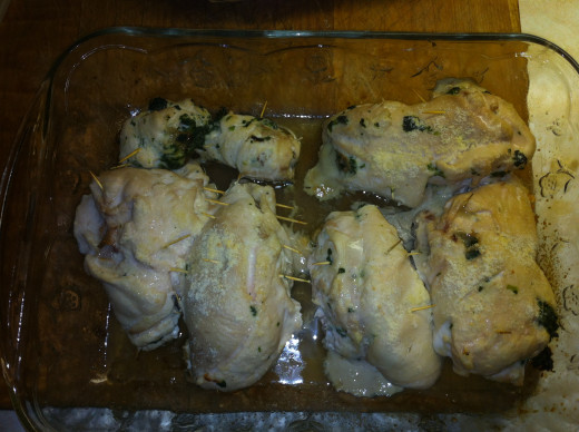 Stuffed chicken breasts are cooked and ready to serve.