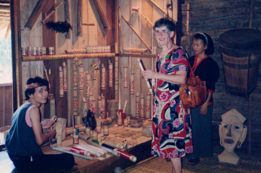Choosing a Local Flute at the Sarawak Cultural Village