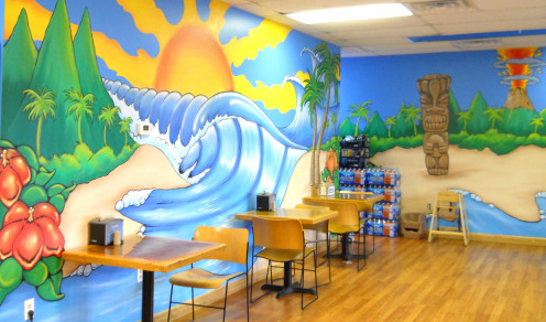 Beach themed murals cover the interior walls. 