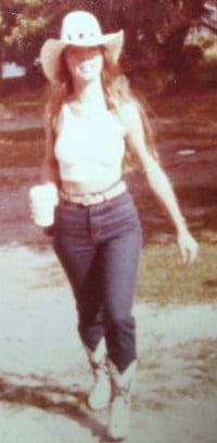 That was then.  Notice the waist length hair behind the waist I was able to show!