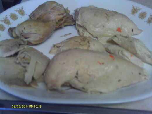 Large pieces of chicken are removed and refrigerated for another meal.