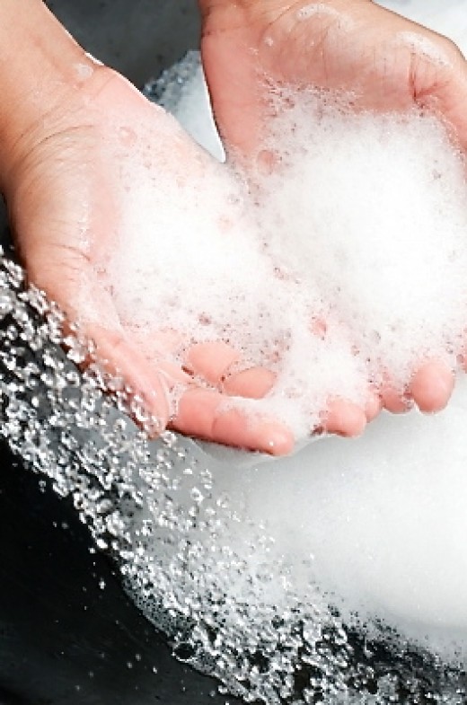 Washing the hands with soap removes many harmful bacteria. Washing the hands with soap removes many harmful bacteria.