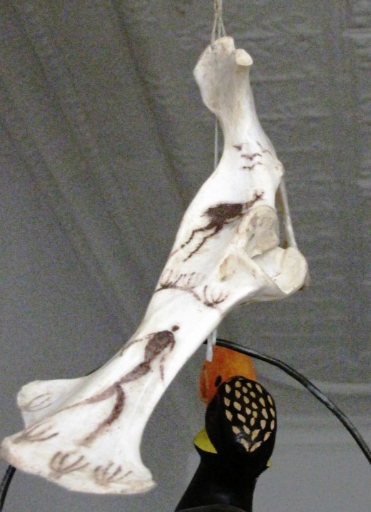 Springbuck Thighbone and Bushman painting