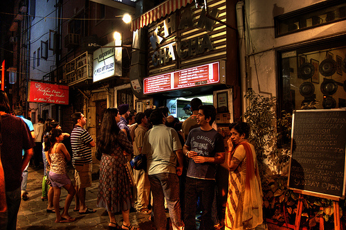 People standing in queue late night waiting for their favorite meals at Khan Chacha's Kebab Corner in Khan Market.