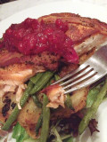 Bacon-Wrapped Salmon with Cranberry Chutney: A Vibrant Contrast in Color and Texture.