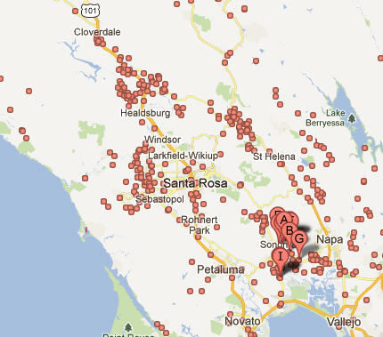Map of Sonoma and Napa Counties. Sonoma County has MANY more wineries (each dot is one).