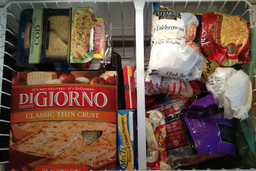 Fits your pizza boxes and the divider is adjustable.