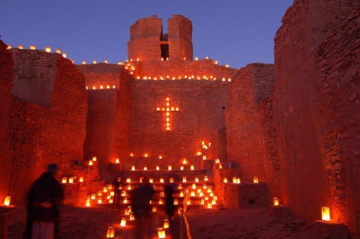 Luminarias outline the old church at the Jemez Monument, New Mexico