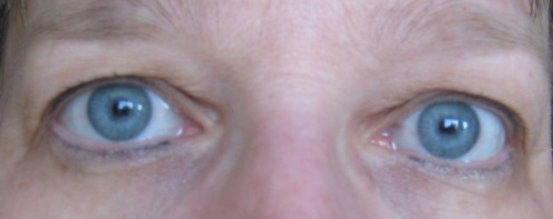 This is the final look after several weeks. I went back and had her only touch up the lower eyelids as I was happy with the natural look of the uppers. My lower lids again did not take  the tattoo in an even manner  but it looks better then it did.