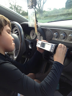 In this photo, Lucas, a 10 year old changes out an old head unit in an Acura. He shows steps on how to do this and has a lot of pictures showing what each steps looks like. Its a great skill to learn and something he will always know how to do.