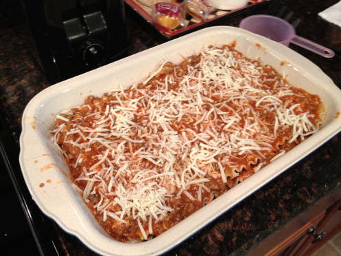 Finish the top with a layer of the meat mixture and sprinkle with 1 cup of shredded mozzarella