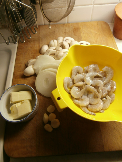 Ingredients for two side dishes: Fried Mushrooms and Cajun Shrimp.