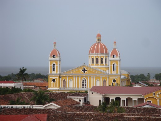 This is the Catholic Church that is on the east side of the central park.  Lake Nicaragua is seen behind the church.