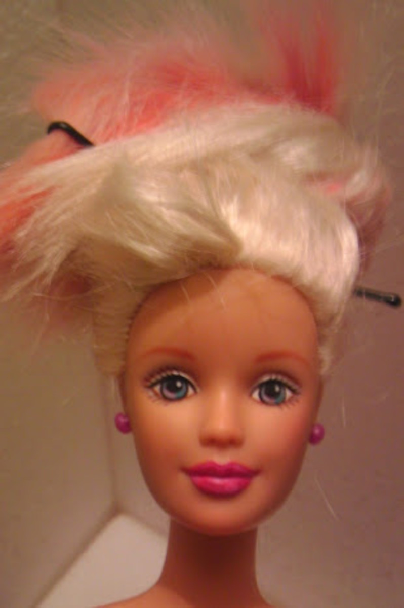 As a reminder, here's what Barbie's face looked like before her snazzy zombie makeup.