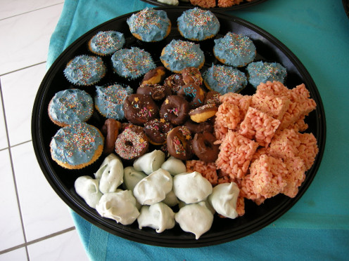 kids party platter with meringues, cupcakes, rice crispy treats and mini doughnuts