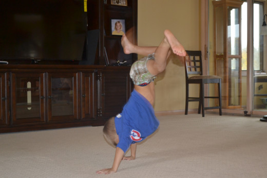 Son displaying his gymnastics skills