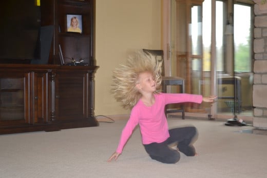My daughter's hair raising gymnastics display