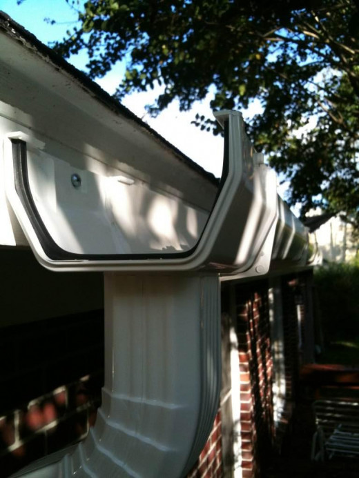 Drop outlet leading to downspout