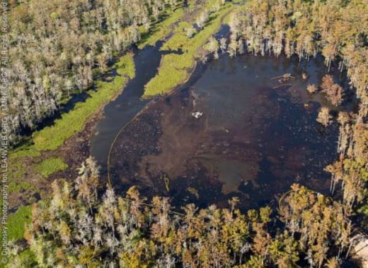 Another natural storage tank or Salt Dome ruptures creating a sinkhole that spills its contents in the surrounding bayou. 