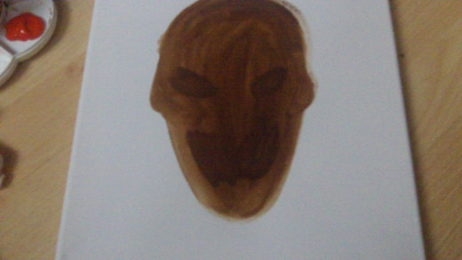 Solid brown color for the eyes and mouth.