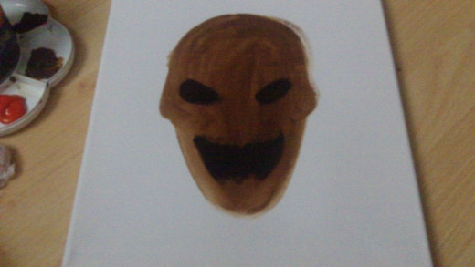 Black paint over the eyes and the mouth.