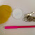 thin sponge, a circle lid, keys to test, marker pen