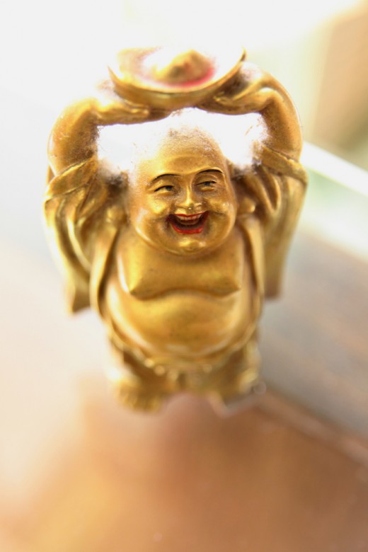 Laughing Buddha of Metal