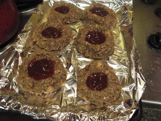 Make indention in patties and fill with ketchup or BBQ sauce.