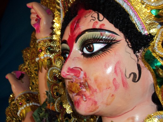 Goddess Durga smeared with Vermilion ( Sindoor)