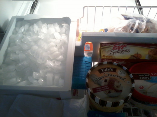 Upper Basket drawer with ice maker.