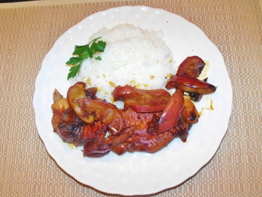 Served with fluffy white rice and garnish.  Yum!