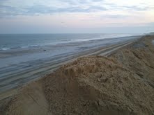 THE SAND BROUGHT UP FROM THE OCEANS EDGE TO REBUILD OUR BEACH AND THE DUNES TO PROTECT US FROM FUTURE STORMS. WE ALL HAVE TO START ALL OVER AGAIN.
