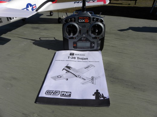 A transmitter is needed to fly RC planes.  Many models are available.  Mike's transmitter is a Spektrum DX 6i