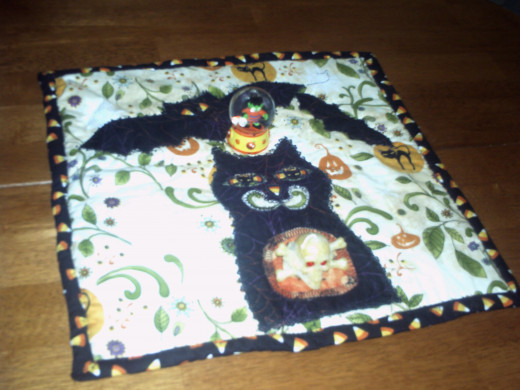When just on the table some other small items were added  Skull and crossbones and small Frankenstein Globe just fit