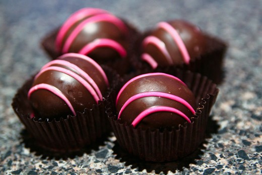 Enjoy your favorite dessert such as these Raspberry chocolate truffles.