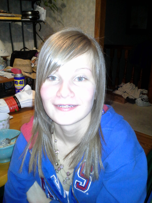 (my daughter) Erica Green after hair cut, style and waxing eyebrows for the first time.