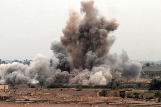 Fallujah, Iraq (Nov. 8, 2004) - An air strike is called in on a suspected insurgent hideout at the edge of Fallujah, Iraq by U.S. Marines assigned K Company, 3rd Battalion, 5th Marine Regiment, 1st Marine Division, during the opening hours of Operati