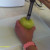 Apple corer in center of apple