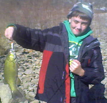 A nice keeper-size smallmouth bass was a blast to catch for this young angler.