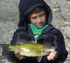 Ohio River smallmouth bass fight with the spirit  of the river where they live.