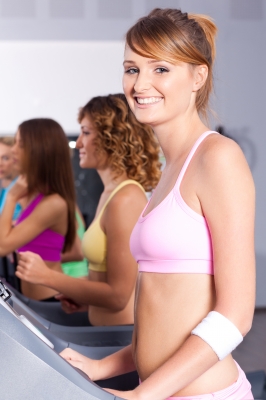 Group Of Women Running On Treadmill