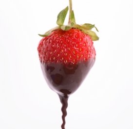 Replace heavy desserts like pastries and tiramisu with fruity ones like this one - Strawberries dipped in warm chocolate.