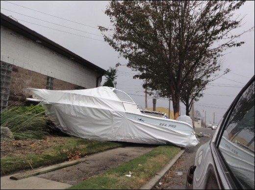 Unsold boats strewn along the roadways
